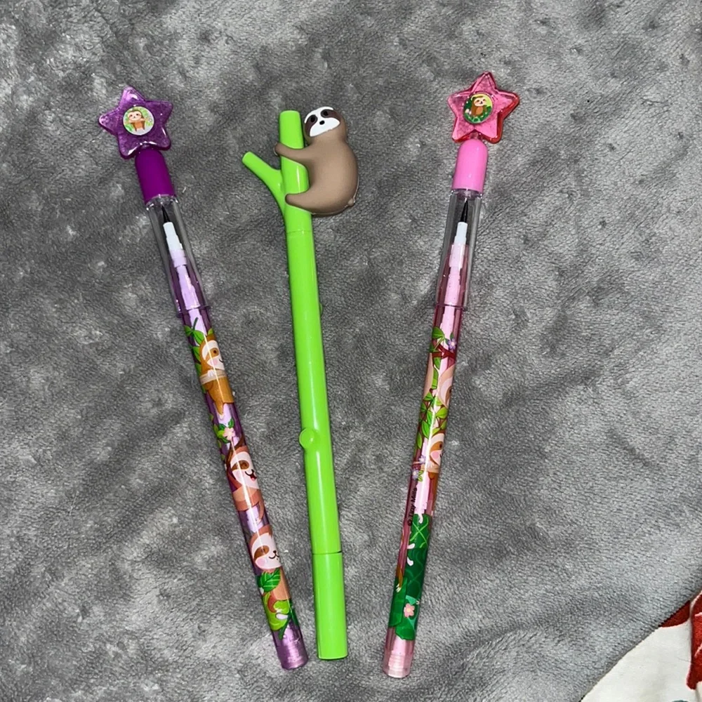 Stocking stuffers - 2 sloth pop up pencils and a pen
